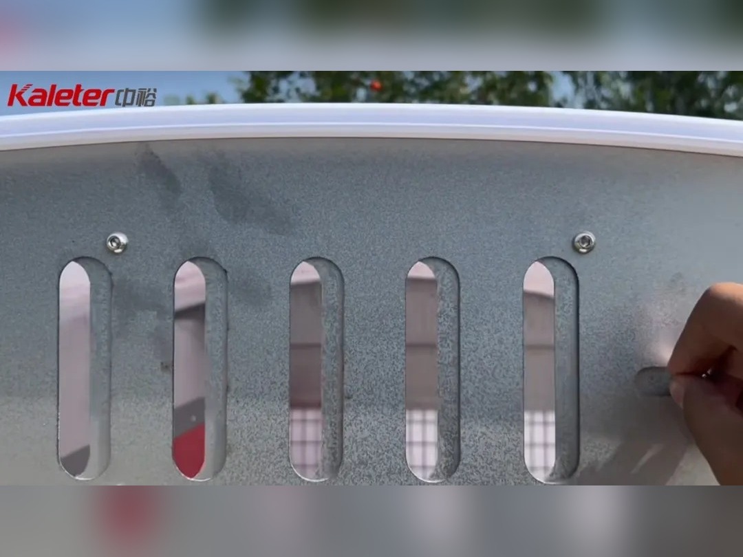 Close-up of the adjustable roof ventilation slots on the mobile chicken house